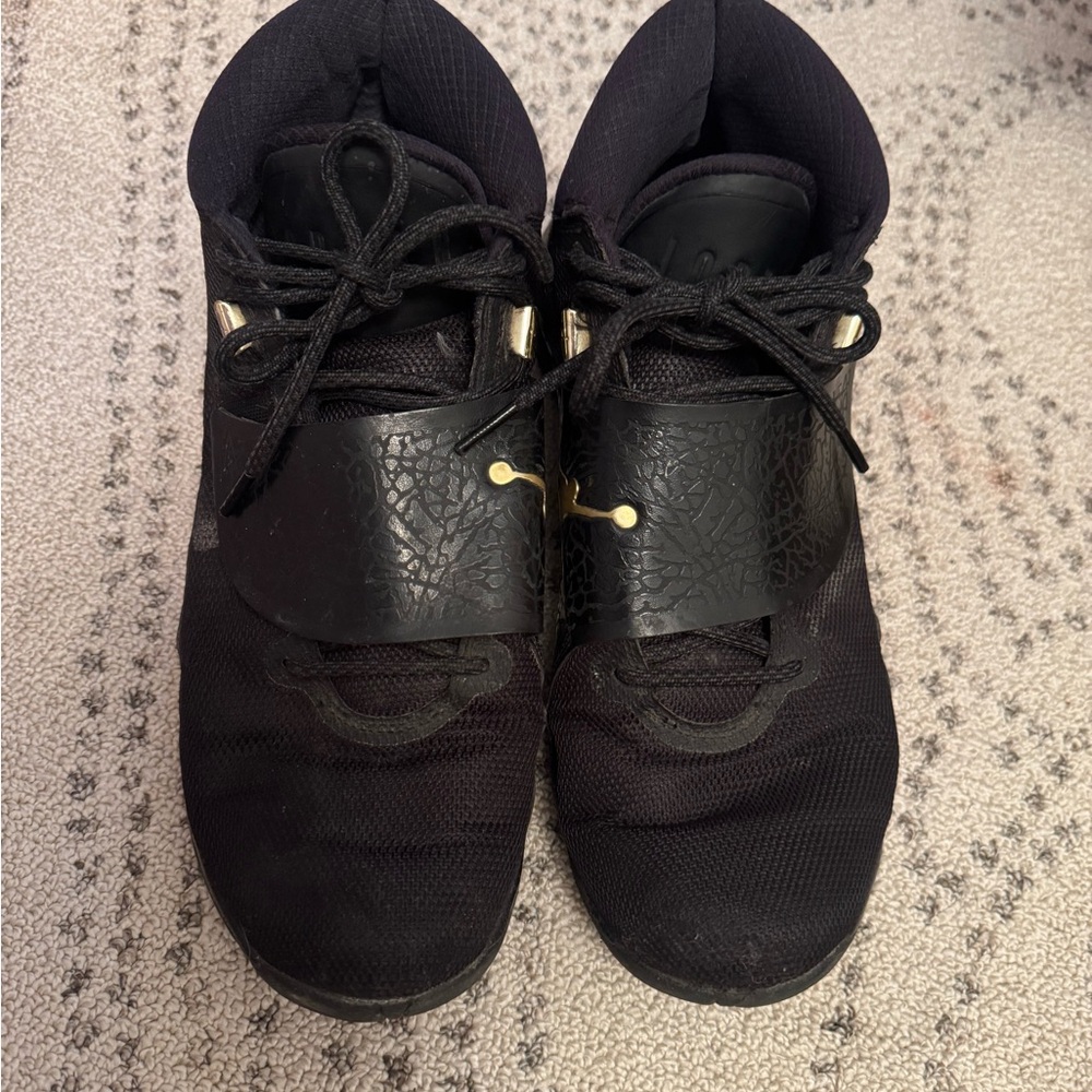Jordan Black and Gold Athletic Shoes